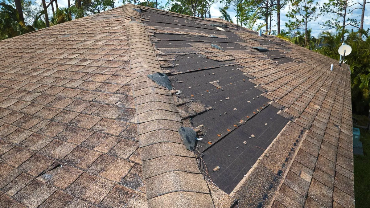 Roof leak repair stopping water damage